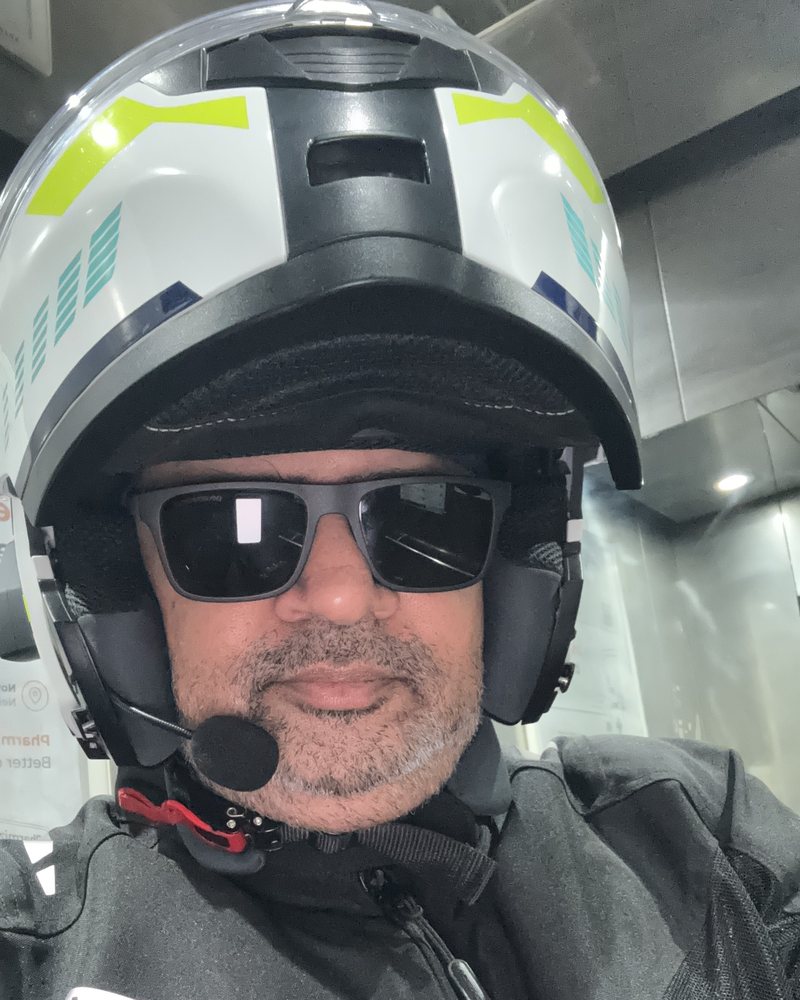 Selfie in helmet and sunglasses, ready to ride